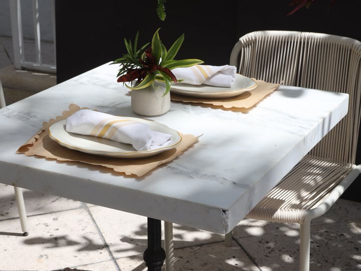 a table set for lunch on the terrace